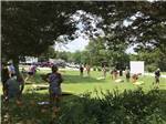 View larger image of People competing at corn hole at LAZY DAY CAMPGROUND image #6