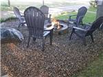 A ring of chairs around the fire pit at TOWN & COUNTRY CAMP RESORT - thumbnail