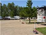 Flower pots in front of the RV sites at SHERK'S RV PARK - thumbnail