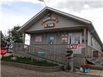 RV park office with signage at NORTHERN LIGHTS RV PARK - thumbnail