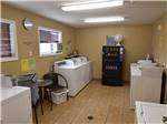 Laundry room with window and vending machine at NORTHERN LIGHTS RV PARK - thumbnail
