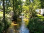 Sites near the creek at WHISPERING PINES CAMPGROUND & RV PARK - thumbnail