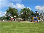 View larger image of A bounce house and playground equipment at LEHMANS LAKESIDE RV RESORT image #8