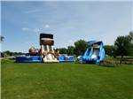 View larger image of A group of inflatable playground equipment at LEHMANS LAKESIDE RV RESORT image #9