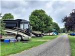 The gravel road next to the parked RVs at SHIPSHEWANA CAMPGROUND SOUTH PARK - thumbnail