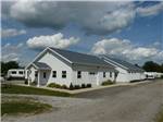 A view of two white buildings at SHIPSHEWANA CAMPGROUND SOUTH PARK - thumbnail