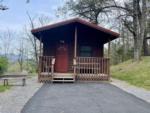 Small wooden cabin at FOOTHILLS RV PARK & CABINS - thumbnail