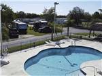 View larger image of An aerial view of the swimming pool at SONRISE PALMS RV PARK image #5