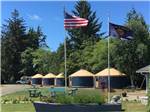View larger image of Five yurts with brown tops and blue sides at TILLAMOOK BAY CITY RV PARK image #5