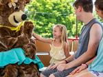 Yogi bear meeting children at 	Yogi Bear's Jellystone Park Camp-Resort Lakes Region - thumbnail
