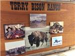 A sign with photos on it at TERRY BISON RANCH RV PARK - thumbnail