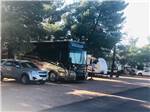View larger image of Motorhome parked in campsite at ZUNI VILLAGE RV PARK image #2