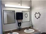 View larger image of The clean bathroom sinks at TRAVELCENTERS OF AMERICA RV PARK image #8