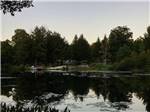Looking at the campsites over the water at WOODLAND CAMPGROUND - thumbnail