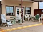 View larger image of The front porch with seating at STAGECOACH STOP RV PARK image #6