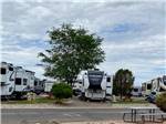 View larger image of One of the pull thru RV sites at STAGECOACH STOP RV PARK image #11
