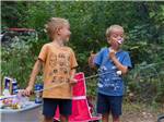 Kids enjoying roasted marshmallows at LAKE BYLLESBY CAMPGROUND - thumbnail