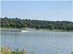 A speed boat on the lake at Lake Byllesby Campground - thumbnail