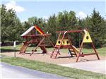 The wooden playground equipment at COTTONWOODS RV PARK - thumbnail