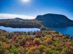 Fall trees with lake view at Spacious Skies Balsam Woods - thumbnail