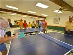 Campers playing ping pong at SUN LIFE RV RESORT - thumbnail