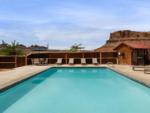 Pool with mountains in the view at Sun Outdoors Canyonlands Gateway - thumbnail