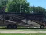 Motorhome parked in a campsite at BEACON RV PARK - thumbnail