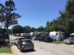 View down the road of campers in sites at BEACON RV PARK - thumbnail