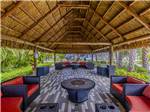 Covered lounge seating around fire pits - thumbnail