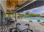 Table and chair seating near the pool - thumbnail