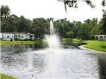 Lodging on the lake with erupting fountain in its center at HIGHBANKS MARINA & CAMPRESORT - thumbnail