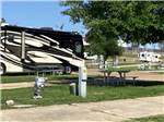 View larger image of A picnic table under a tree at AMERISTAR CASINO  RV PARK image #12