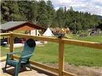 Looking at the playground from the deck at FORT WELIKIT FAMILY CAMPGROUND - thumbnail