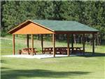 A covered pavilion with picnic tables at FORT WELIKIT FAMILY CAMPGROUND - thumbnail