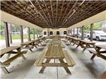 View larger image of Picnic benches under a pavilion at COLD SPRINGS CAMP RESORT image #4