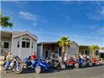 View larger image of Campers riding motorcycles at APACHE WELLS RV RESORT image #7