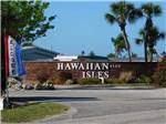 View larger image of The front entrance sign at HAWAIIAN ISLES image #7