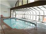 View of indoor pool with window wall at ALDERWOOD RV PARK - thumbnail