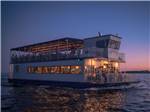 Party boat at night - thumbnail
