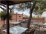 An outdoor eating area at STAMPEDE RV PARK - thumbnail