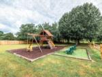 Play area at site Twin Oaks RV Park - thumbnail