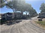 A row of trailers in RV sites at ELKO RV PARK - thumbnail