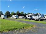 RVs parked in spots on sunny day at PARKVIEW RV PARK - thumbnail