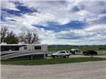 One of the occupied gravel RV sites at MOUNTAIN RANGE RV PARK - thumbnail