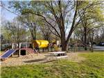 The children's playground equipment at PIN OAK RV RESORT BY RJOURNEY - thumbnail