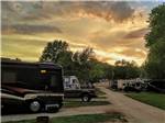 The RV sites at dusk at PIN OAK RV RESORT BY RJOURNEY - thumbnail