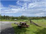 View larger image of Picnic bench on grass near gravel site at CAMPING RIMOUSKI image #2
