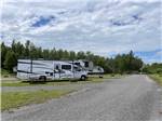View larger image of Gravel road leading to sites occupied by RVs at CAMPING RIMOUSKI image #3