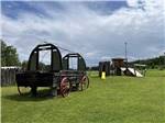 View larger image of Wagon and play structure on broad lawn area at CAMPING RIMOUSKI image #4