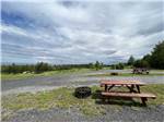 View larger image of Gravel sits with picnic tables and fire pits at CAMPING RIMOUSKI image #11